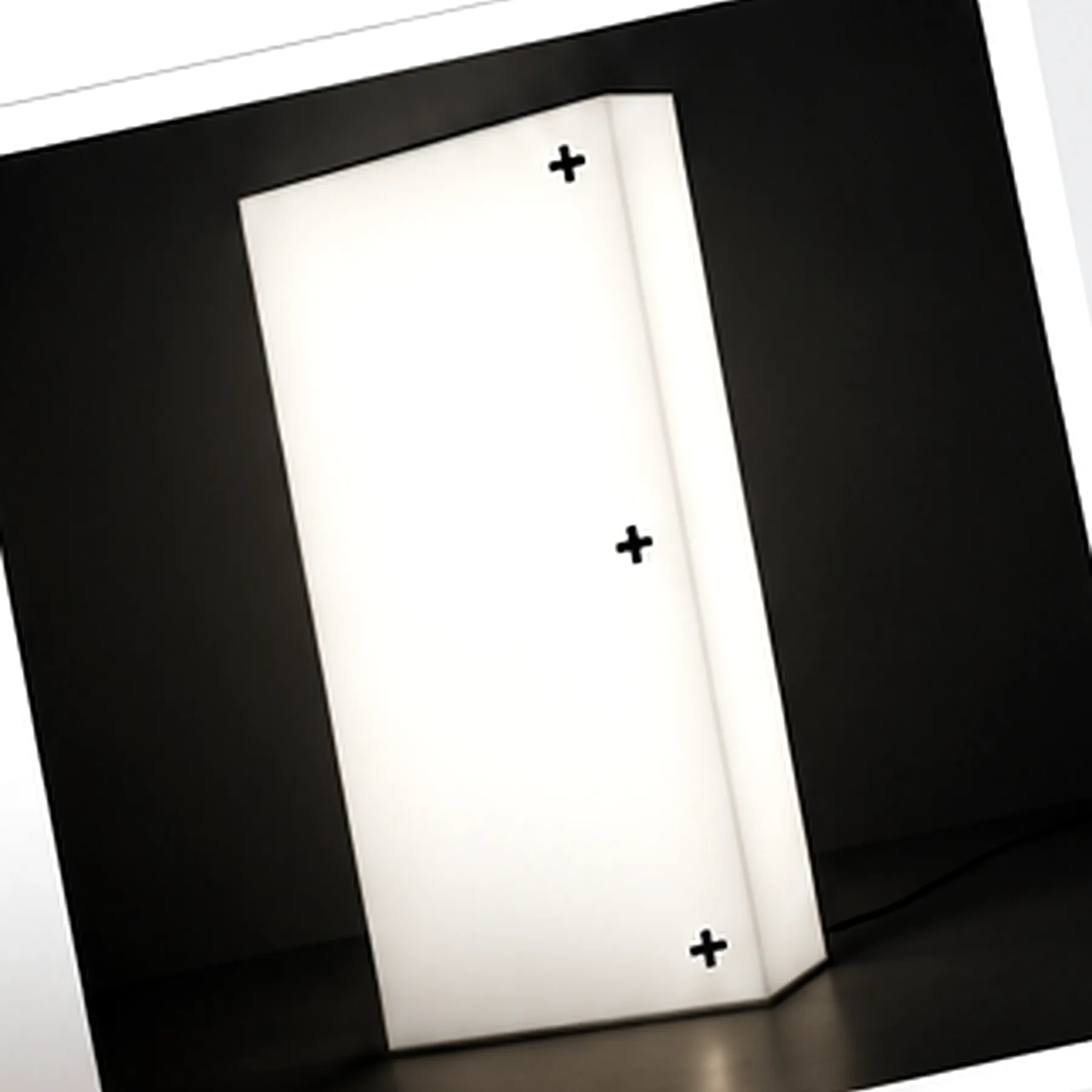 Sculptural white door set in a black architectural frame